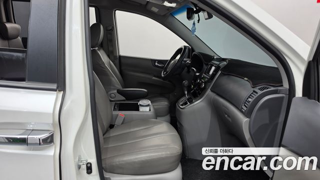 Kia Canival 2013 — photo 11