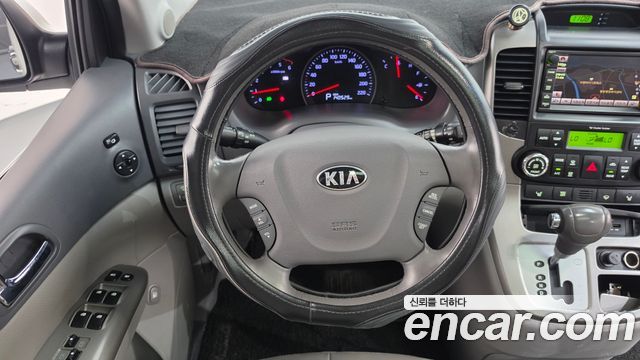 Kia Canival 2013 — photo 13
