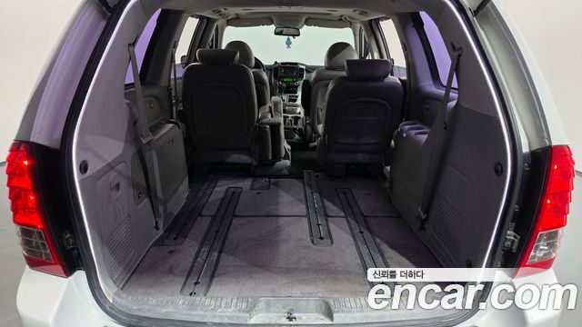 Kia Canival 2013 — photo 20