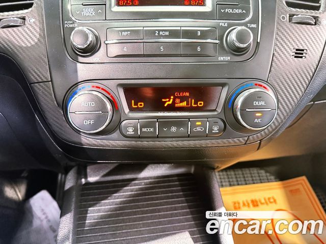 Kia K3 2013 — photo 13