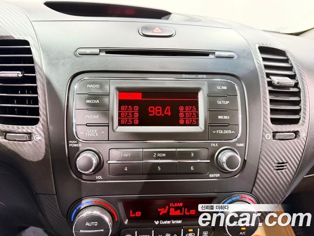 Kia K3 2013 — photo 14