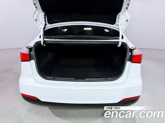 Kia K3 2013 — photo 19
