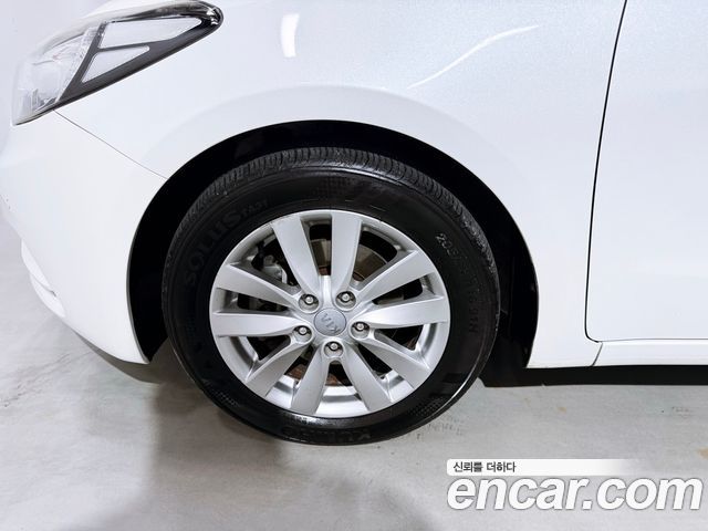 Kia K3 2013 — photo 20