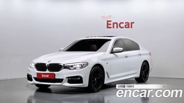 BMW 5-Series 2018 — photo 1