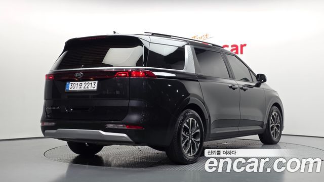 Kia Canival 2021 — photo 2
