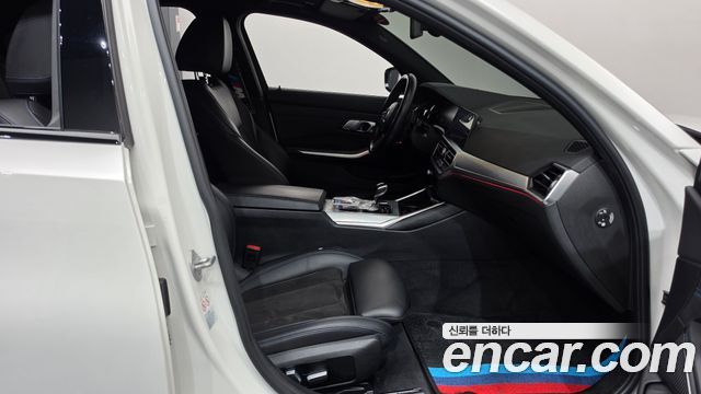 BMW 3-Series 2022 — photo 16