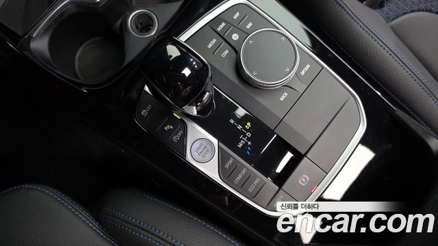 BMW 1-Series 2023 — photo 12