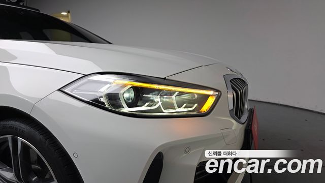 BMW 1-Series 2023 — photo 8