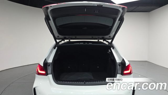 BMW 1-Series 2023 — photo 27