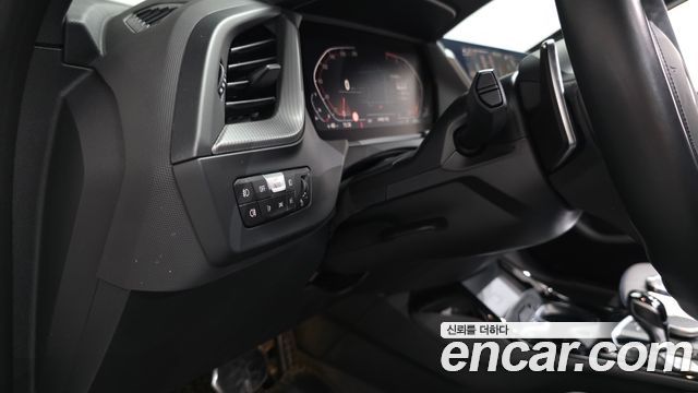 BMW 1-Series 2023 — photo 30