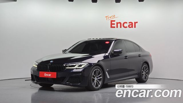 BMW 5-Series 2023 — photo 1