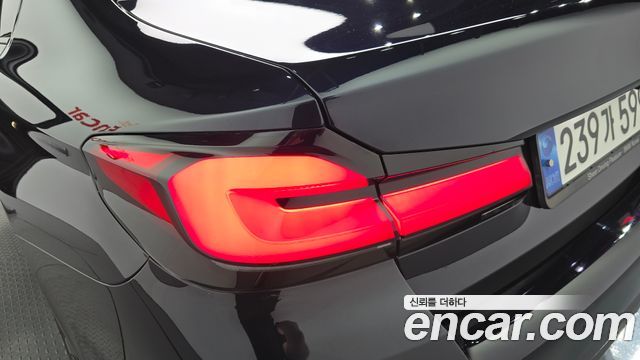 BMW 5-Series 2023 — photo 9