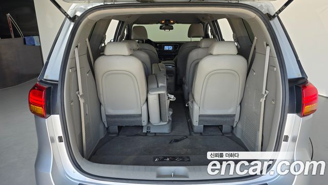 Kia Canival 2015 — photo 26