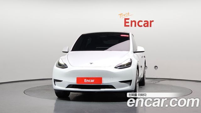 Tesla Model Y 2024 — photo 3
