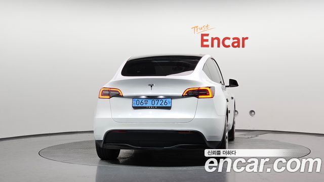 Tesla Model Y 2024 — photo 4