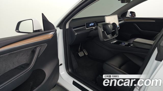 Tesla Model Y 2024 — photo 17