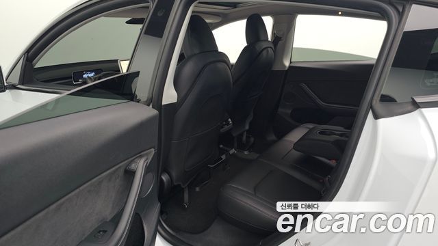 Tesla Model Y 2024 — photo 18