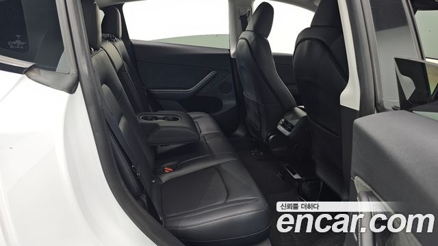 Tesla Model Y 2024 — photo 16