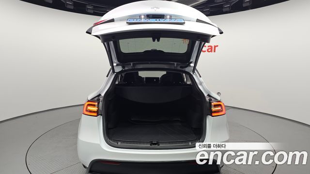 Tesla Model Y 2024 — photo 27