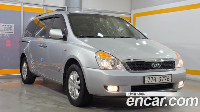 Kia Canival 2010 — photo 3