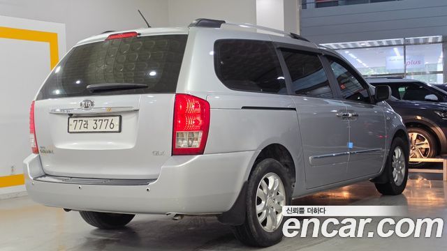 Kia Canival 2010 — photo 4