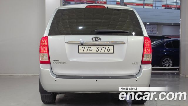 Kia Canival 2010 — photo 5