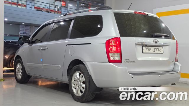 Kia Canival 2010 — photo 6