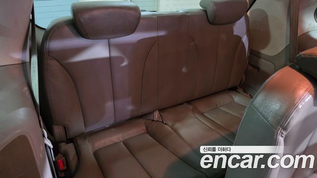 Kia Canival 2010 — photo 9