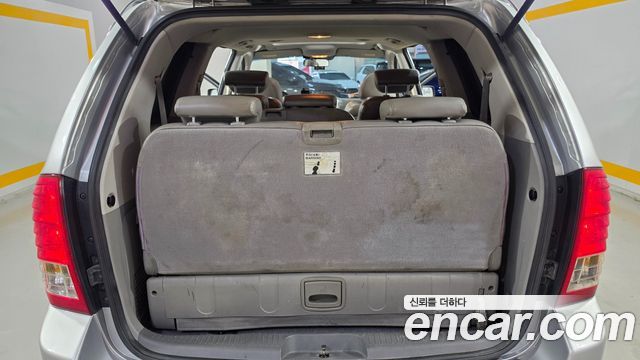 Kia Canival 2010 — photo 18
