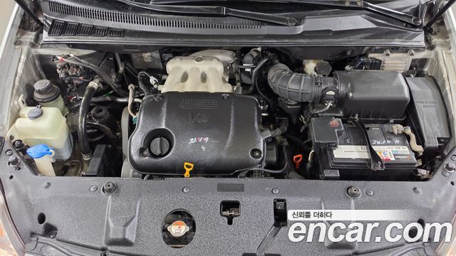 Kia Canival 2010 — photo 20