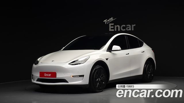 Tesla Model Y 2021 — photo 1