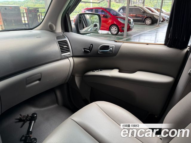 Kia Canival 2013 — photo 17