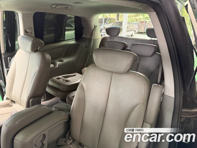 Kia Canival 2013 — photo 18