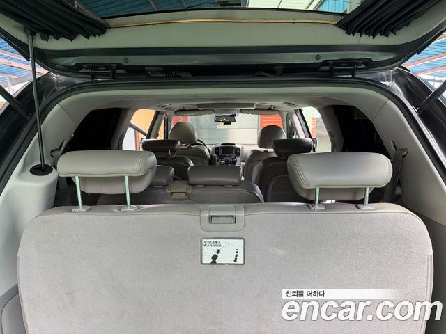 Kia Canival 2013 — photo 19