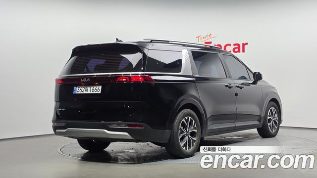 Kia Canival 2023 — photo 2