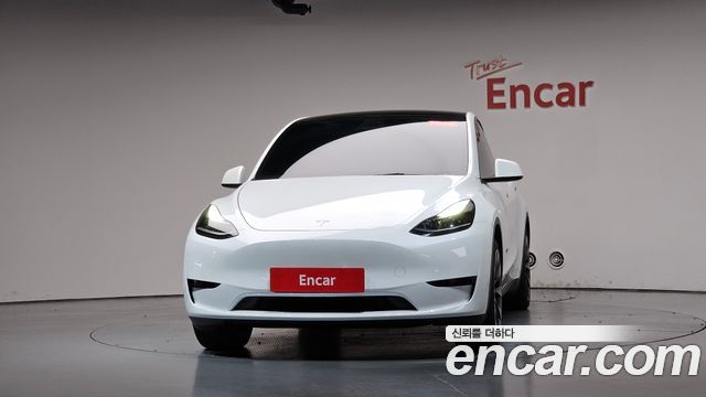 Tesla Model Y 2024 — photo 3