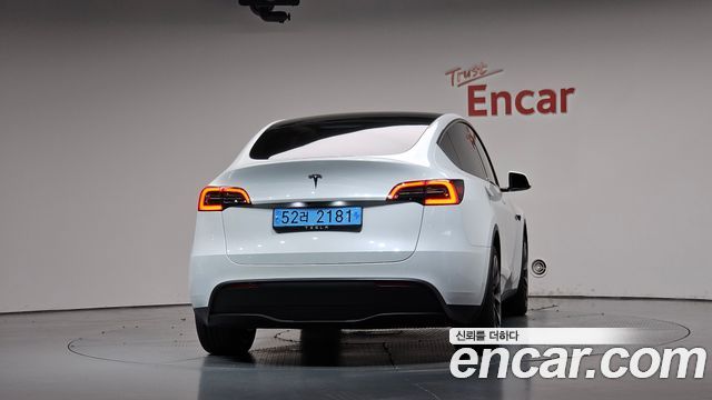 Tesla Model Y 2024 — photo 4