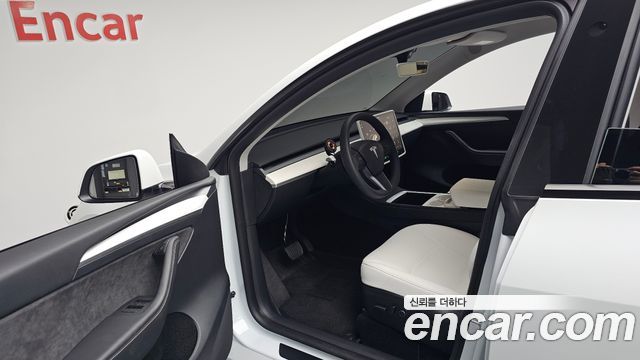 Tesla Model Y 2024 — photo 13