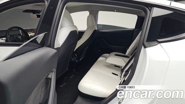 Tesla Model Y 2024 — photo 17