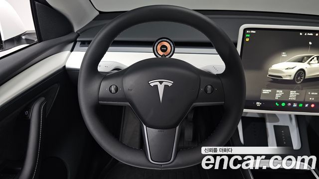 Tesla Model Y 2024 — photo 18