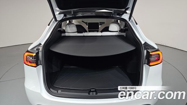 Tesla Model Y 2024 — photo 26