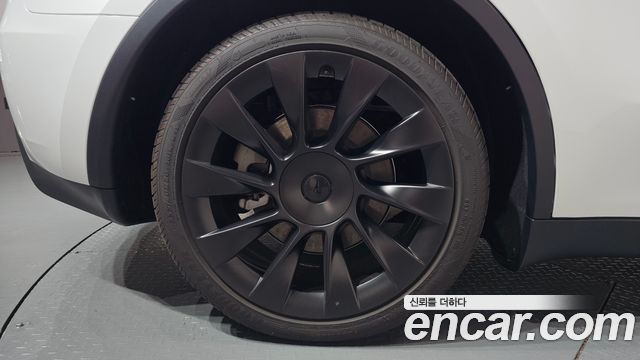 Tesla Model Y 2024 — photo 7
