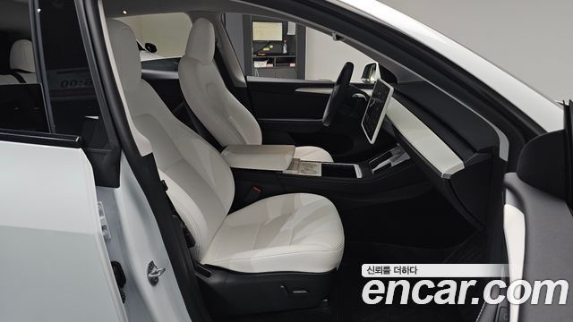 Tesla Model Y 2024 — photo 16