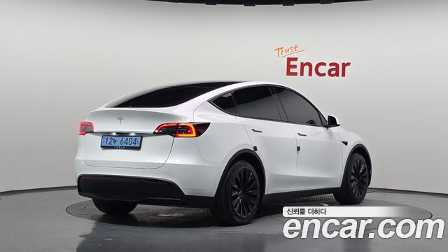 Tesla Model Y 2025 — photo 2