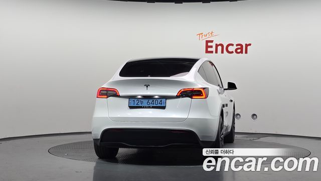 Tesla Model Y 2025 — photo 4