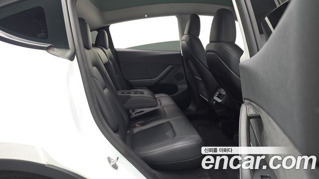 Tesla Model Y 2025 — photo 18