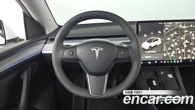 Tesla Model Y 2025 — photo 19
