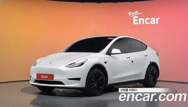 Tesla Model Y 2025 — photo 1