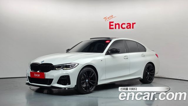 BMW 3-Series 2022 — photo 1