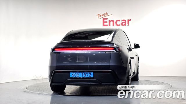 Tesla Model Y 2025 — photo 4